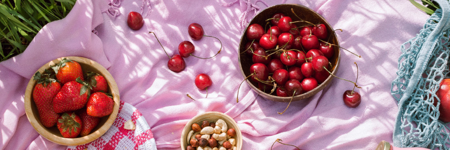 Organic produce on a picnic blanket