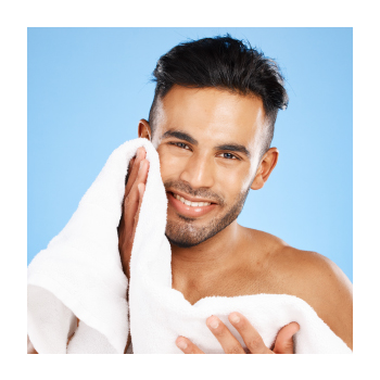 A person using a towel to dry their face