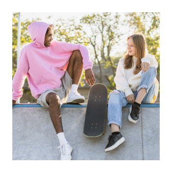 Kids sitting at a skate park