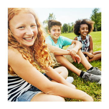 Kids sitting at a park