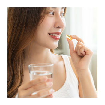 Person taking a supplement