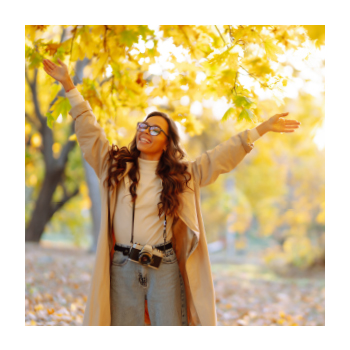 A person with a camera outdoors