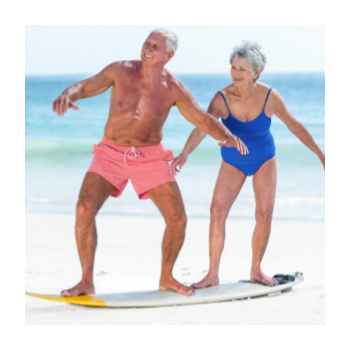 Elderly Couple On Surfboard