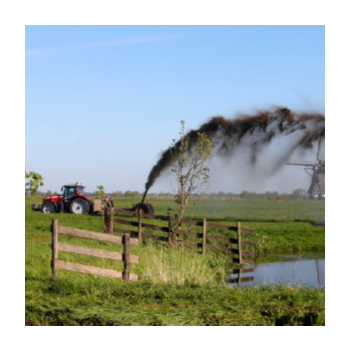 Image of tractor spreading manure on a farm