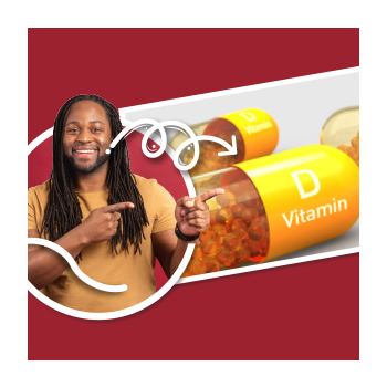 Image of person pointing at vitamin D capsules