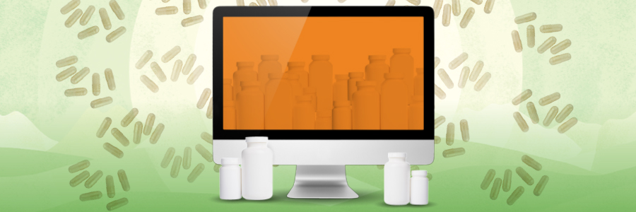 Image of a computer and supplement bottles