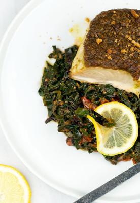 Natural Grocers Pesto Crusted Mahi-Mahi Served with Blistered Tomatoes and Swiss Chard 