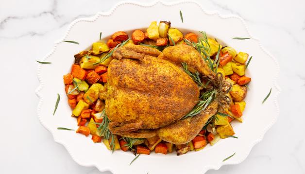 Curry-Spiced Roast Chicken Served with Potatoes, Carrots, and Onion